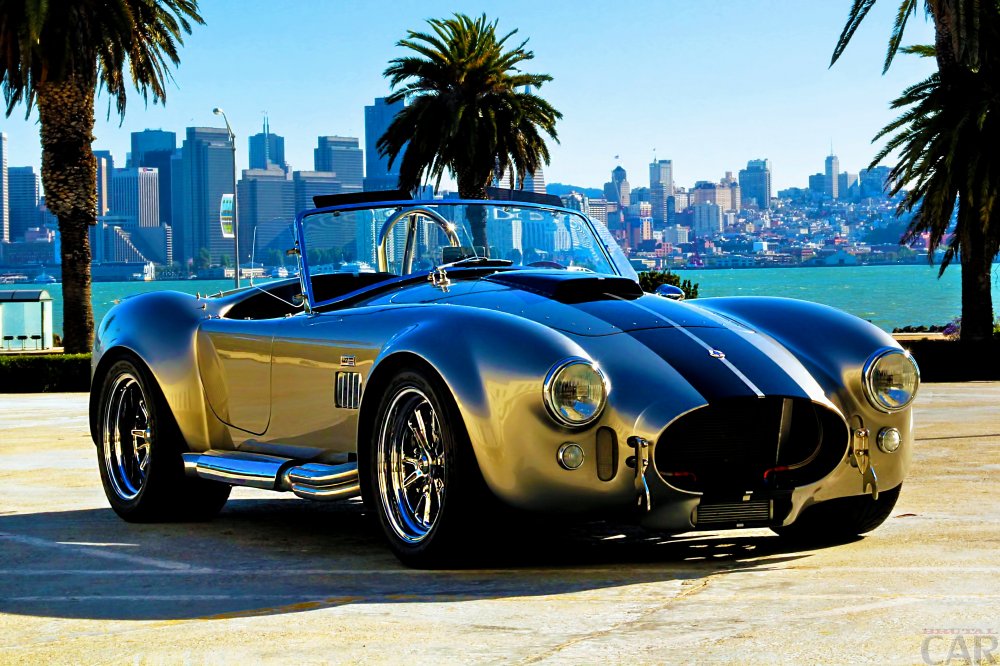 Beautiful picture with prominent auto car AC Cobra.